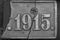 Old steel nameplate with 1915 number