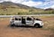 Old stolen car which was stripped and left to rust alongside the highway on the island of Maui in the state of Hawaii.