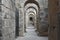 Old stone arch, domed corridors and doors in archaeological site