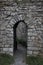 An old stone arched doorway in castle ruins at Aberystwyth, Ceredigion
