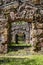 Old stone archway with stone steps of ruins in Jack London state historic park