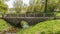 Old stone bridge in the arboretum Alexandria