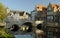 Old stone bridge over a river in Brugge
