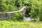 Old Stone bridge in summer - Pyrenees. Andorra la Vella. Andorr