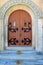 Old stone church with arched doorway and ornate entrance