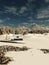 Old Stone Cottage in a Snowy Winter Mountain Landscape