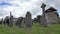 Old stone cross on grave in Scotland