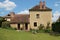 old stone house in a garden in apremont-sur-allier (france)