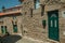 Old stone houses in alley on slope at Monsanto