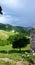 Old stone houses and rainbow in the `Kingdom of Mumjidam`