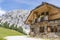 Old stone hut with mountain Gartnerkofel in Carnic Alps