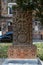 An old stone khachkar with a carved openwork cross with a wicker frame and a circle-a symbol of eternity on the Alley of Crosses i