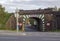 The old stone railway bridge at the junction on the A1 and The Moss Road near lisburn in County Down Northern Ireland