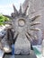 Old stone sculpture representing star or stone sun rays
