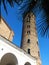 Old stone tower under the sun of Italy Ravenna