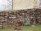 The old stone wall is behind the barn.