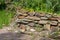 Old stone wall with crushed rocks of granite show the historic wall building from archeology tourism as decorative border