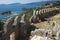 Old stone walls of Simena castle and tranquil Mediterranean coast landscape in Simena Kalekoy. Ancient fortress