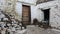 Old Stone Walls And Wooden Door