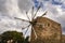 Old stone windmill near Toplou monastery in Crete, Greece