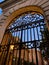 Old stone and wrought iron doorways of Italian roman villa at dusk in Rome, Italy