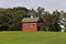 Old storage shed with a cupola and weather vane