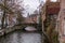 Old street of Bruges with traditional medieval houses