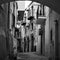 Old street in Cefalu town in Sicily