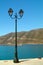 Old street lamppost at port on Lefkada island