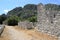 Old street among ruine of ancient city Olympos