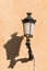 Old streetlamp with shadow