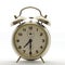 Old style alarm clock, metal, it`s half past seven.