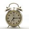 Old style alarm clock, metal, it`s quarter past seven.