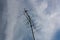 Old style analog television antenna with sky in the background