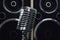 Old style microphone at speakers background