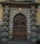 Old style vintage wooden door of ancient mansion is closed