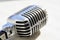 Old style vocal microphone. Retro classic design. Tinted photo