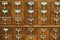 An old style wooden cabinet of library card or file catalog ind