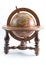 Old style wooden globe on isolated background.