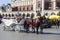 Old-styled horse cab on main market square next to Cloth Hall, Krakow, Poland