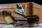 Old stylish suitcase. Old books in a suitcase. Suitcase on a wooden table.