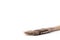 Old stylish worn out wooden vintage rusty paintbrush on white background, copyspace