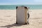 Old suitcase on beach