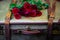 Old suitcase with roses