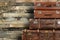 Old suitcases on wooden background