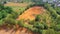 Old sulfuric acid natural tank orange color in south of Poland. View from above.