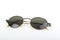 Old sunglasses with metal frame in steampunk style on a white background