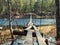 Old suspension bridge over the lake
