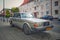 Old Swedish veteran hatchback rusty car Volvo 245 parked