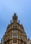 Old symmetrical building on a street corner in Prague, Czech Republic.